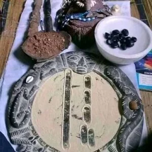 Opon Ifa plateau de divination et cauris noirs — consultation oracle Fa mari infidele emprise maitresse Ouidah